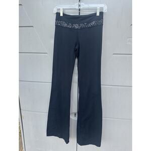 Lululemon Black Cursive Manifesto Groove Flare 30" Yoga Pants Luon Fabric Sz 4